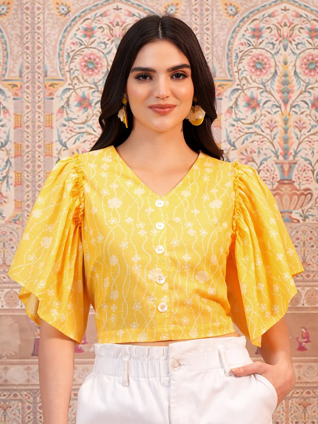 

Vishudh Yellow Floral Printed V-Neck Flared Sleeve Crop Top