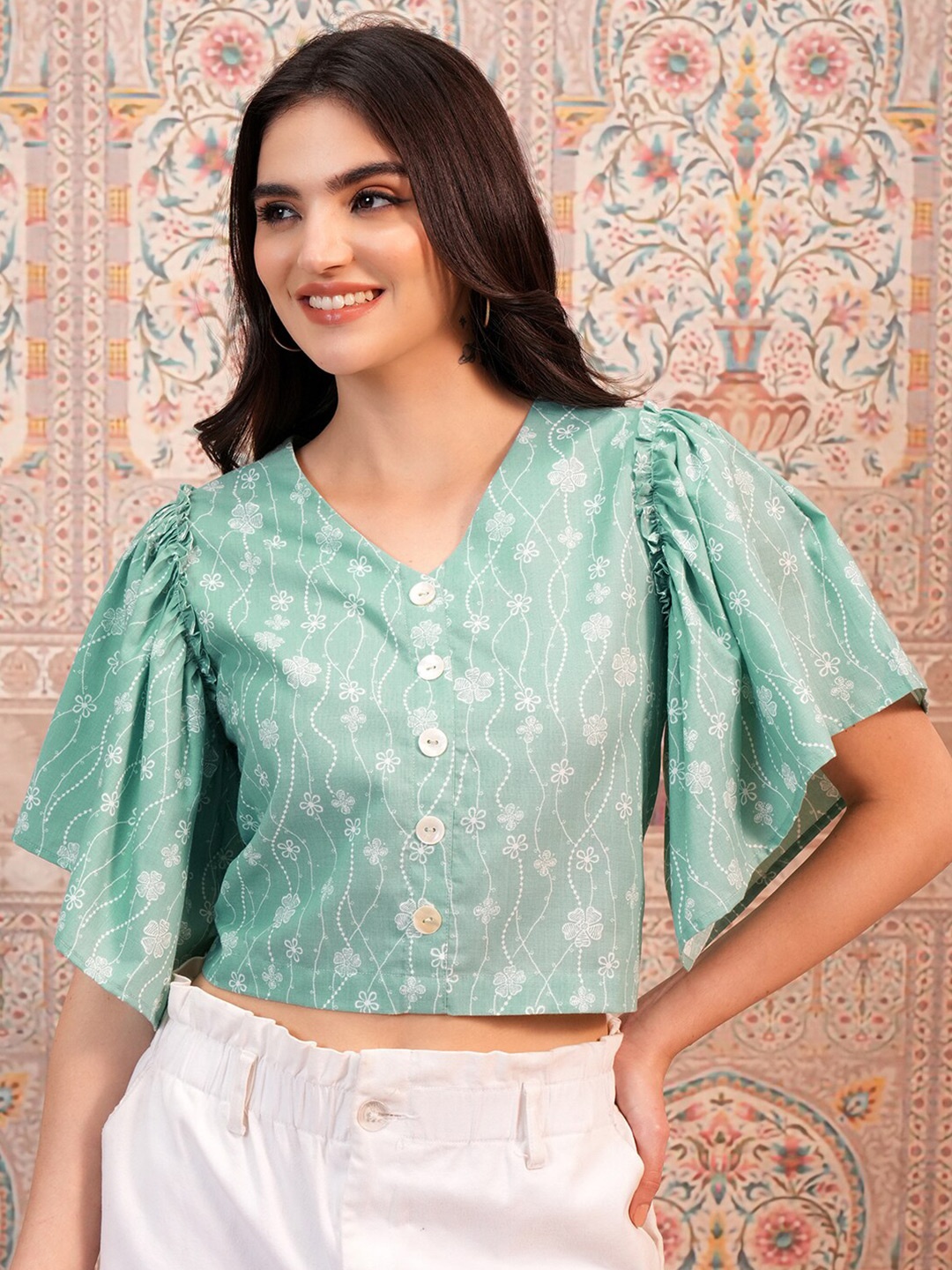 

Vishudh Green Floral Printed V-Neck Flared Sleeve Crop Top