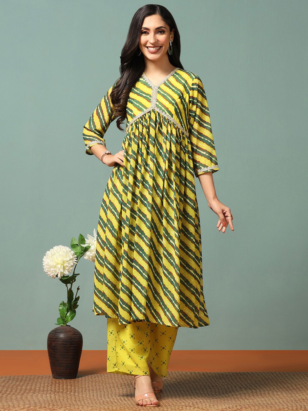 

FASHION DREAM Leheriya Printed Empire Georgette Gotta Patti A-Line Kurta With Palazzo, Yellow