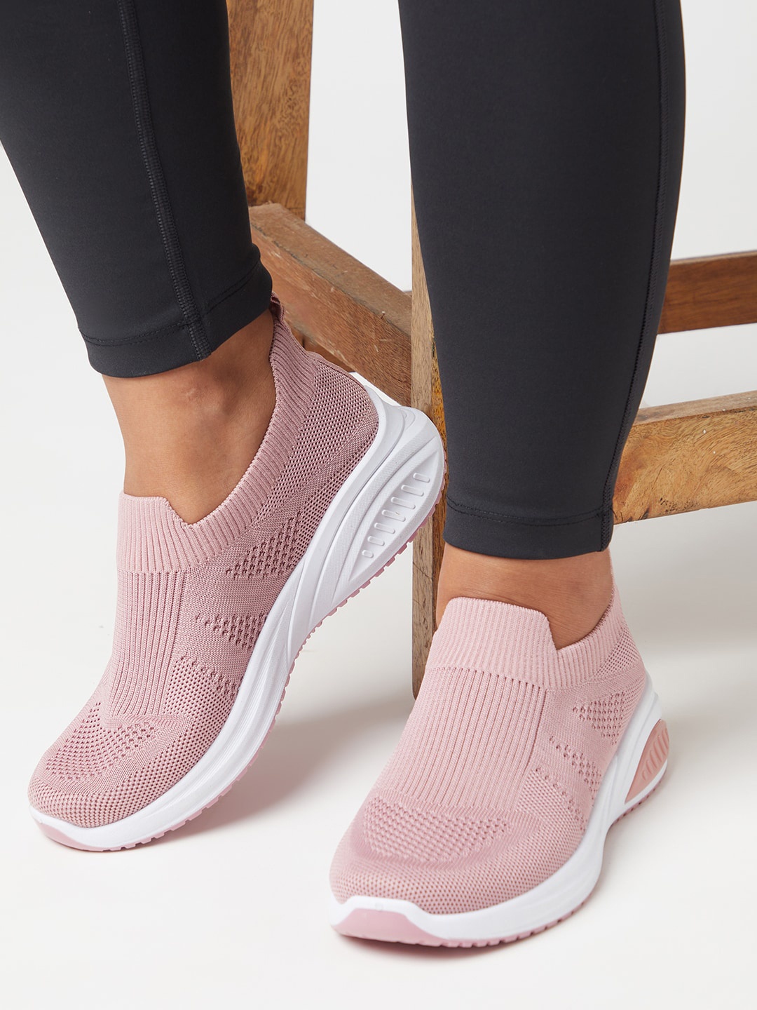 

The Roadster Lifestyle Co. Women Peach Textured Round Toe Textile Slip-On Sneakers