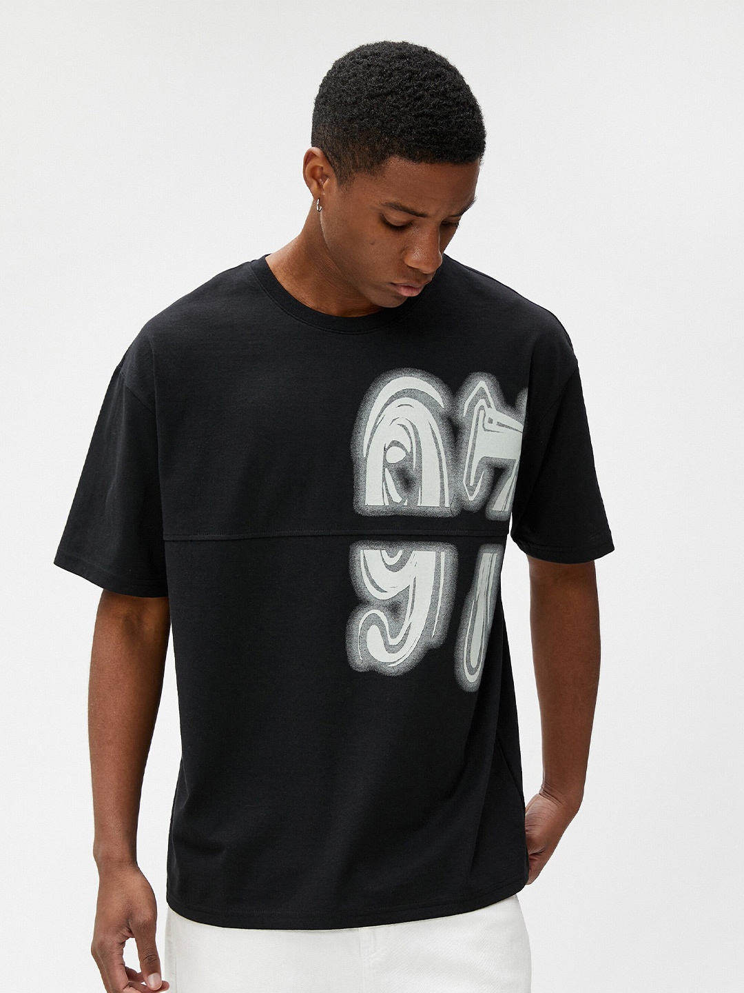 

Koton Typography Printed Drop-Shoulder Sleeves Oversized Cotton T-shirt, Black