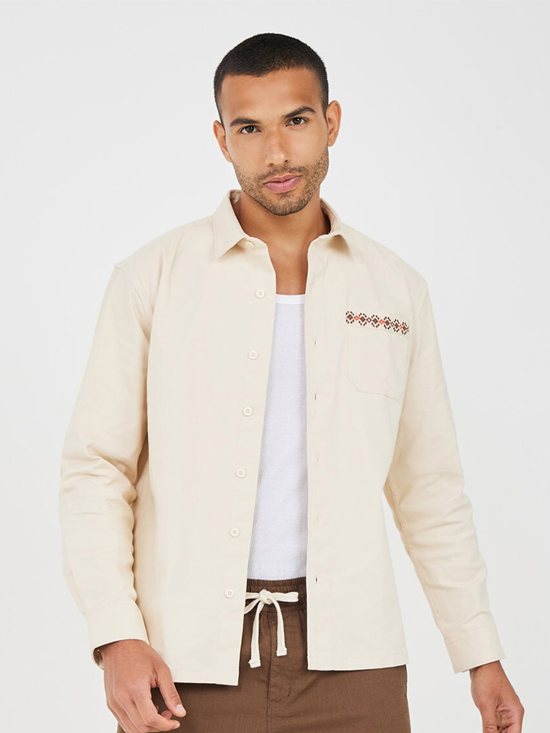 

Styli Cream-Coloured Premium Cotton Twill Oversized Shacket With Back Embroidery Detail