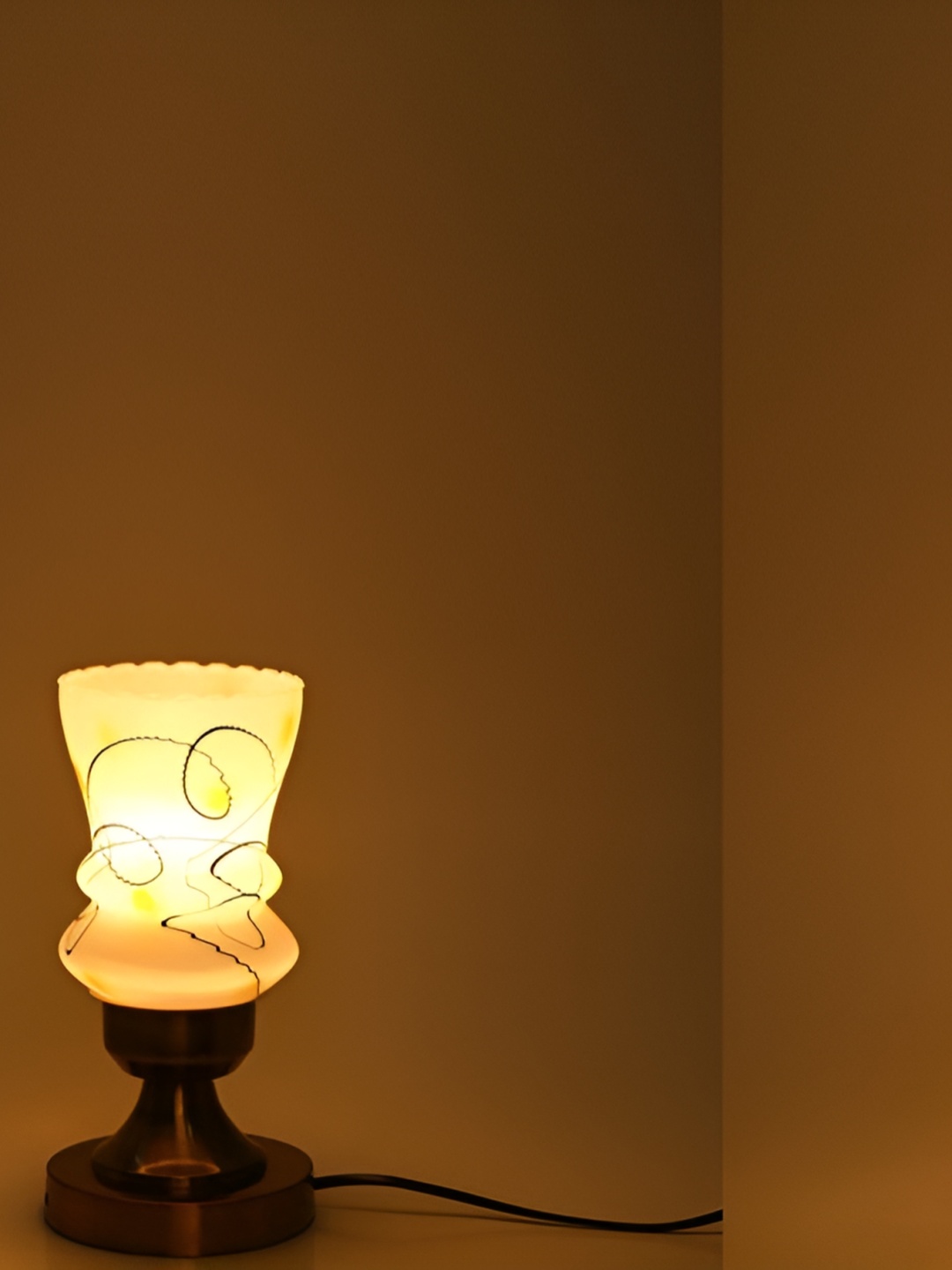 

1ST TIME Yellow & Gold Toned Printed Contemporary Abstract Shaped Metal Table Lamp