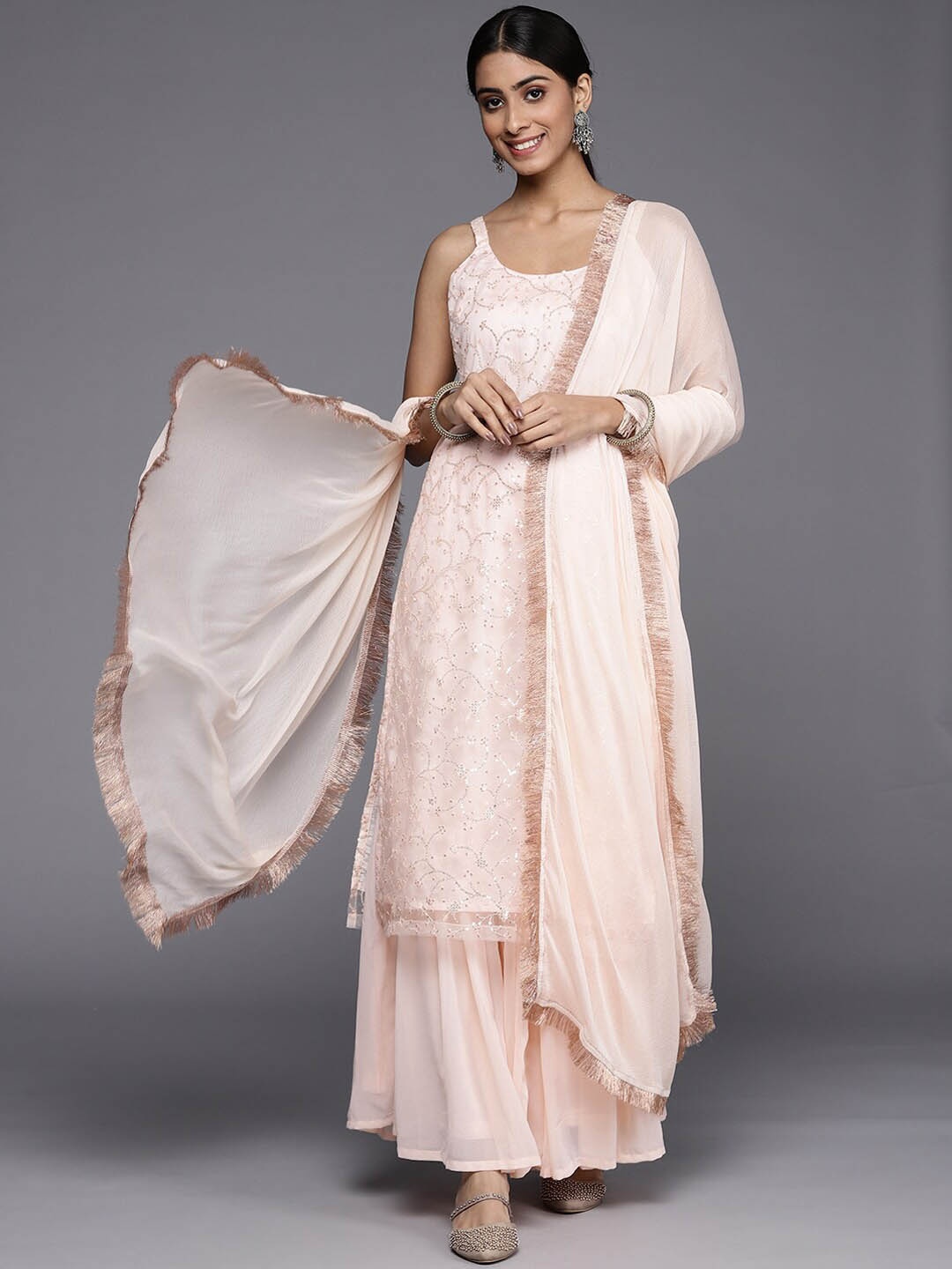 

Mitera Shoulder Straps Floral Embroidered Regular Sequinned Kurta with Sharara & Dupatta, Peach