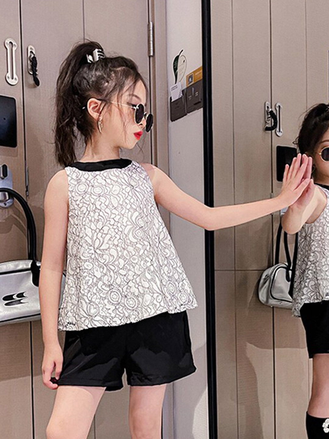 

StyleCast x Revolte Girls White & Black Printed Top with Shorts