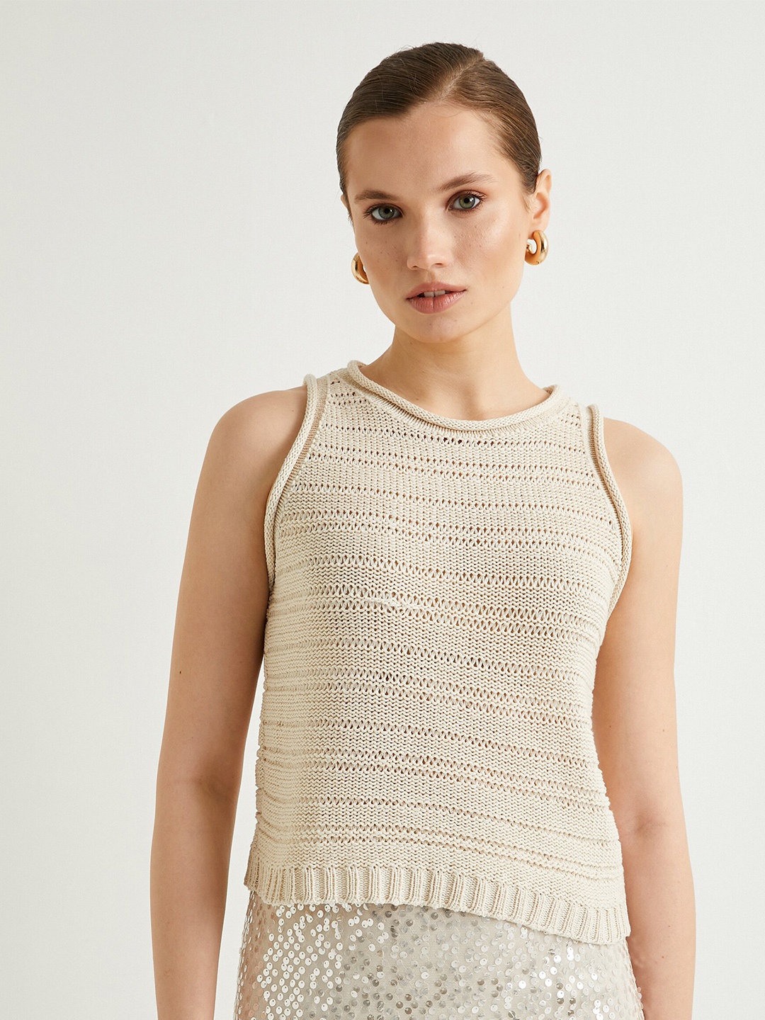 

Koton Self Design Round Neck Sleeveless Fitted Crop Top, Beige