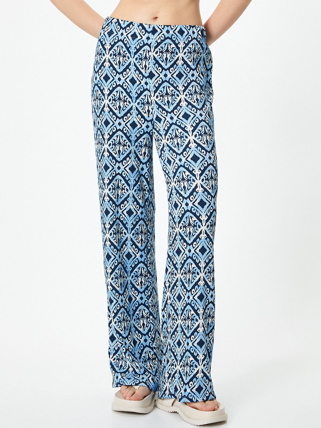 

Koton Women Geometric Printed Flared Parallel Trousers, Blue