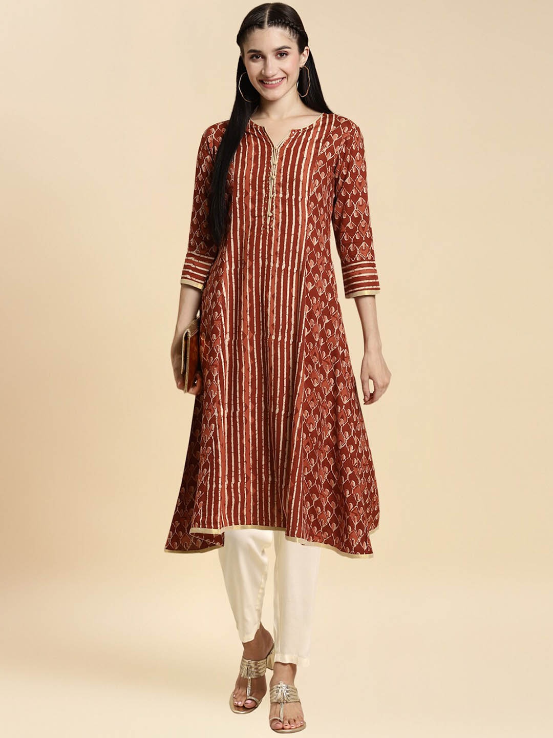 

Rangita Ethnic Motifs Printed Notched Neck A-Line Kurta with Trousers, Rust