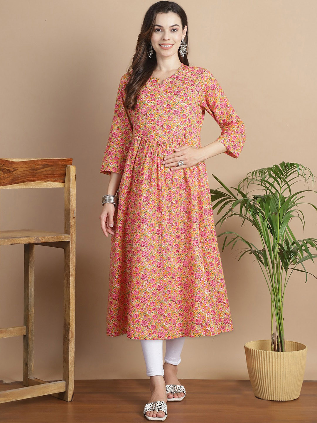 

Secret Wish Women Floral Printed Flared Sleeves Mirror Work Floral Maternity Kurta, Mustard