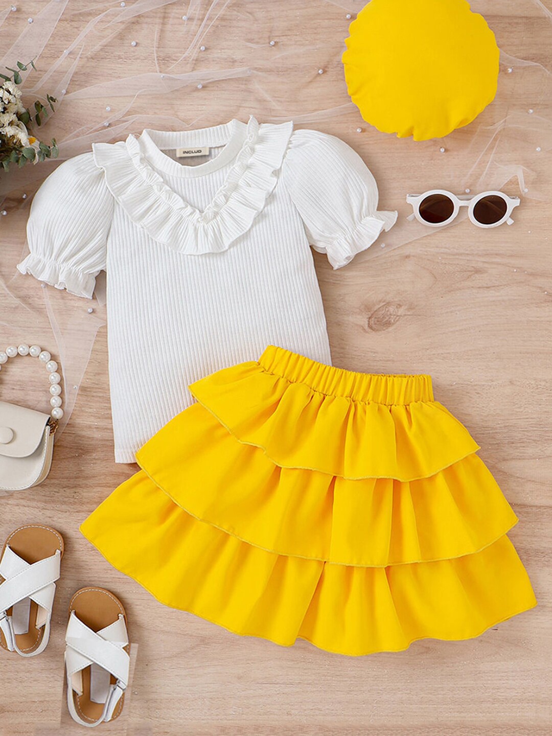 

INCLUD Girls Self Design Puff Sleeves Top With Layered Skirt & Cap, Yellow