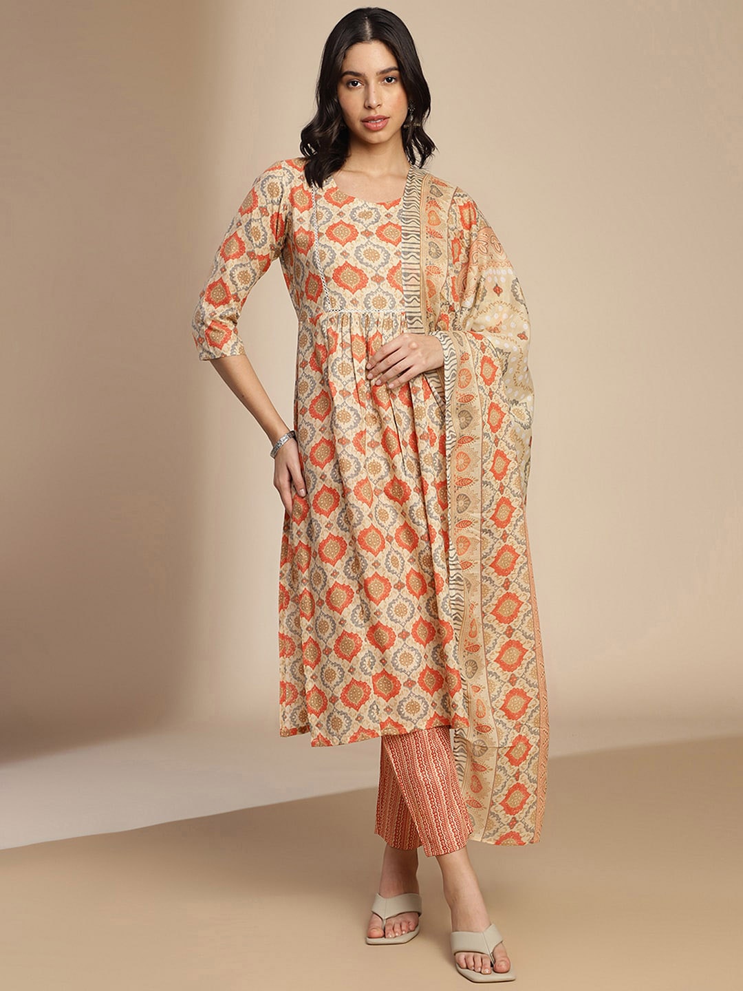 

KALINI Ethnic Motifs Printed Regular Kurta with Trousers & With Dupatta, Beige