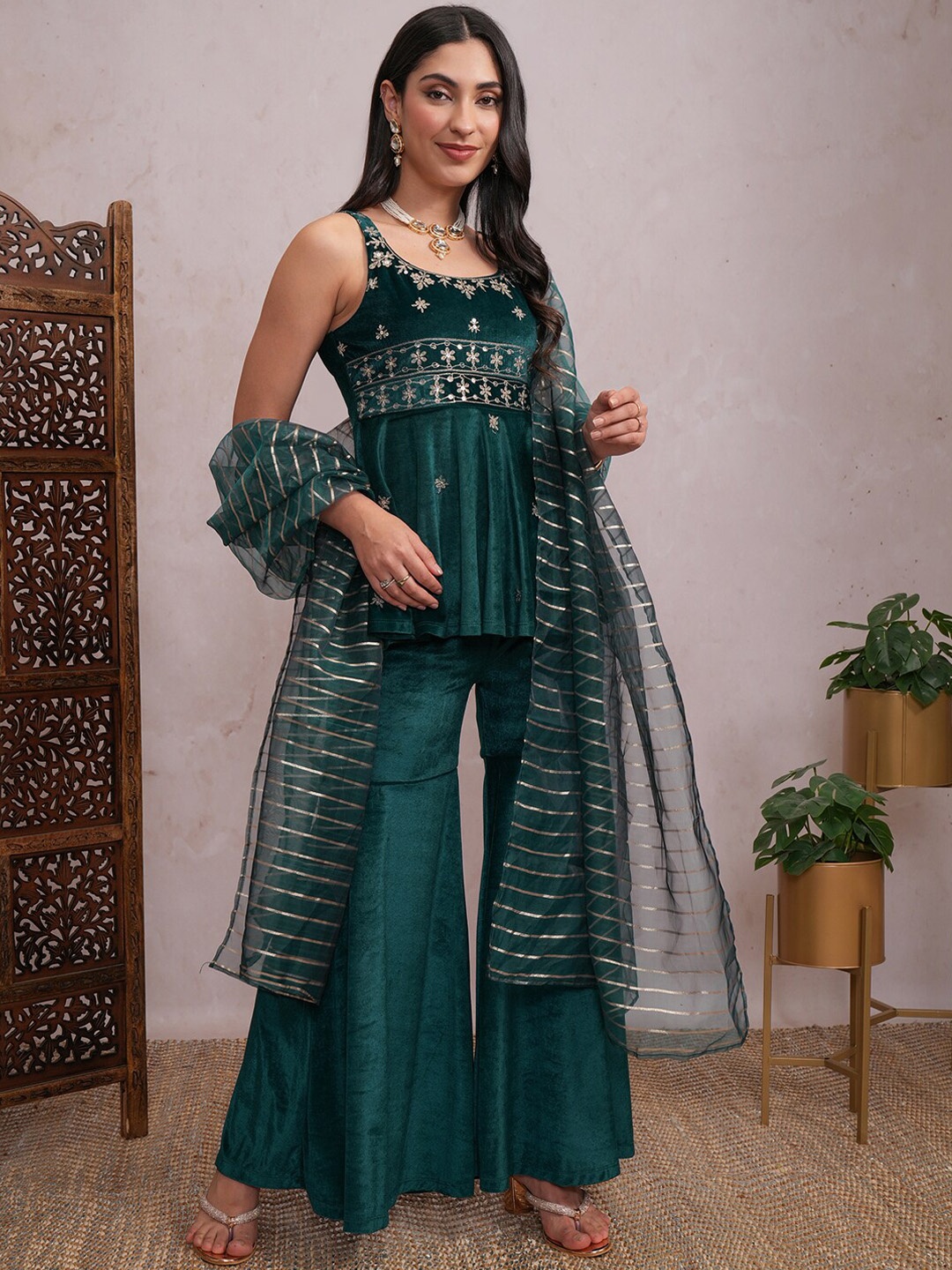 

Vishudh Women Floral Embroidered Regular Sequinned Kurti with Sharara & With Dupatta, Teal