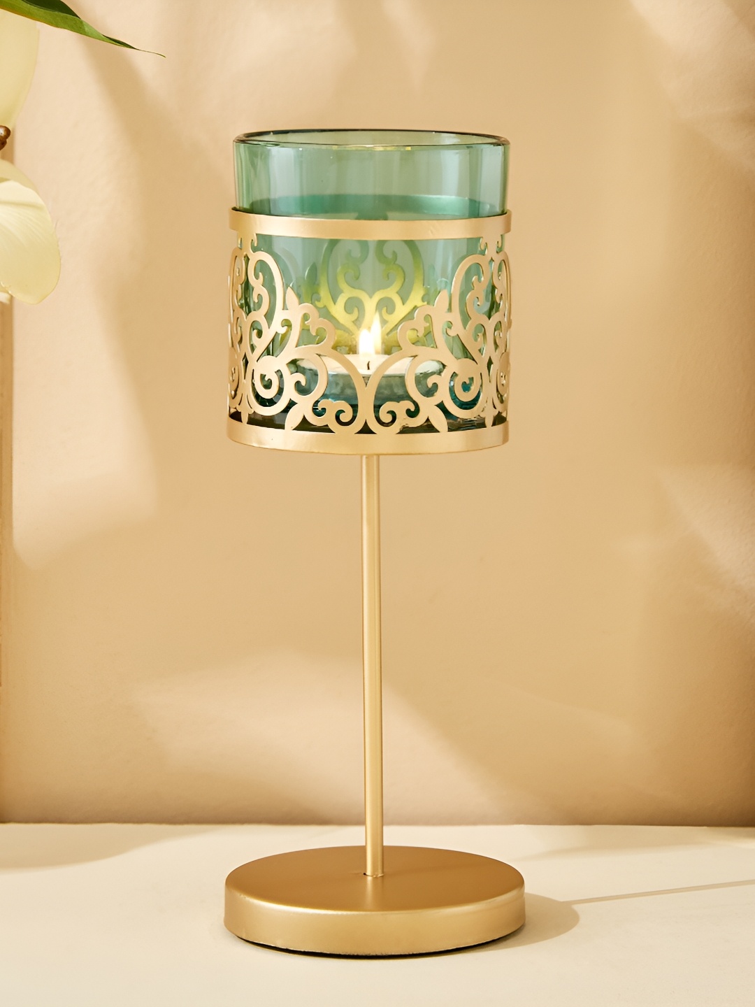 

Home Centre Gold-Toned & Blue Glass Pedestal T-Light Holder