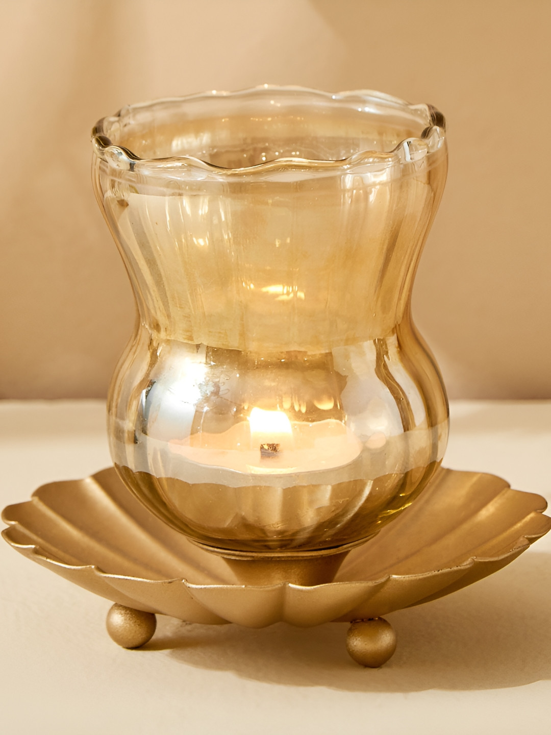 

Home Centre Gold-Toned Glass T-Light Candle Holder