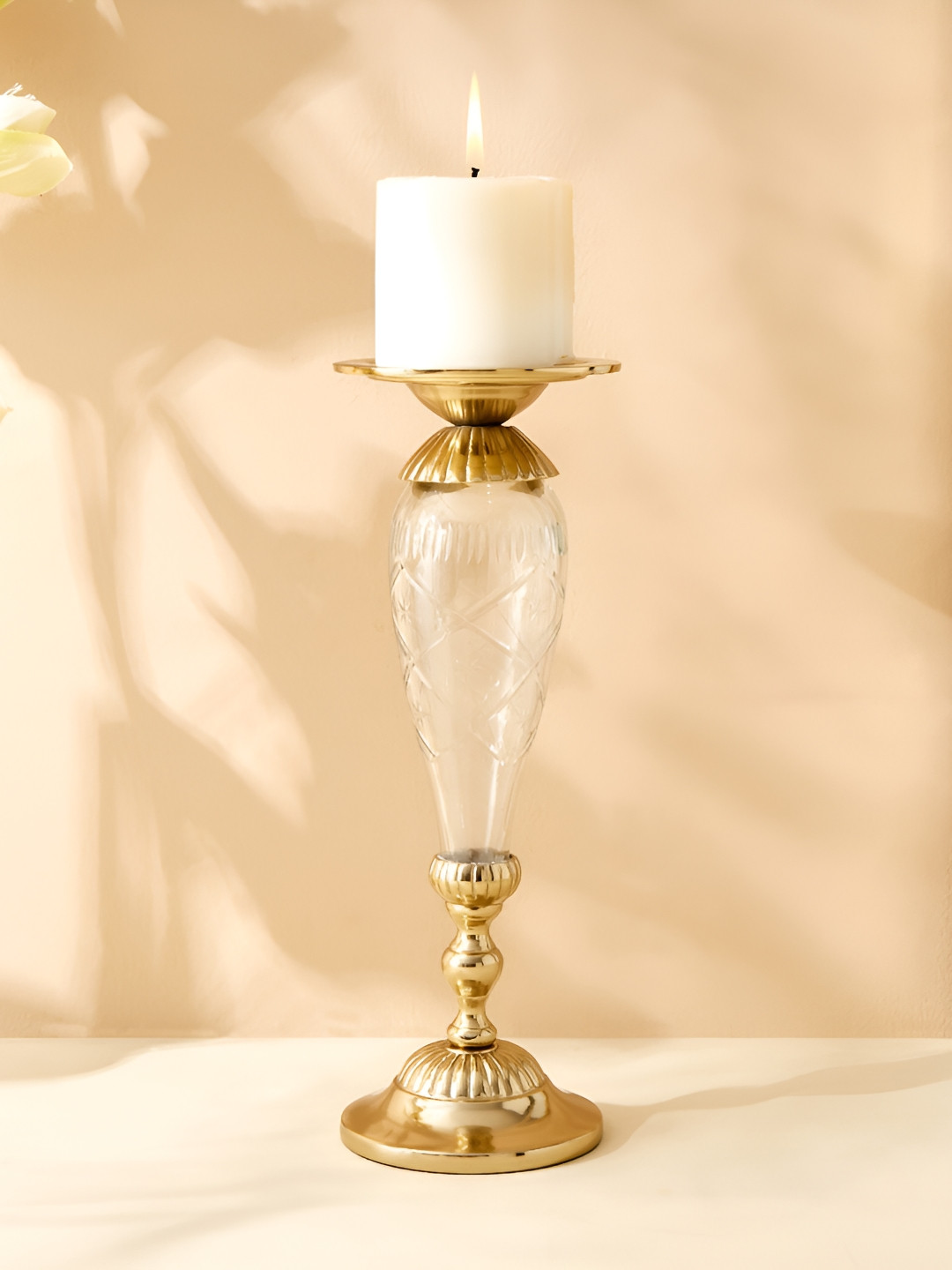 

Home Centre Gold-Toned & Transparent Glass Pillar Candle Holder