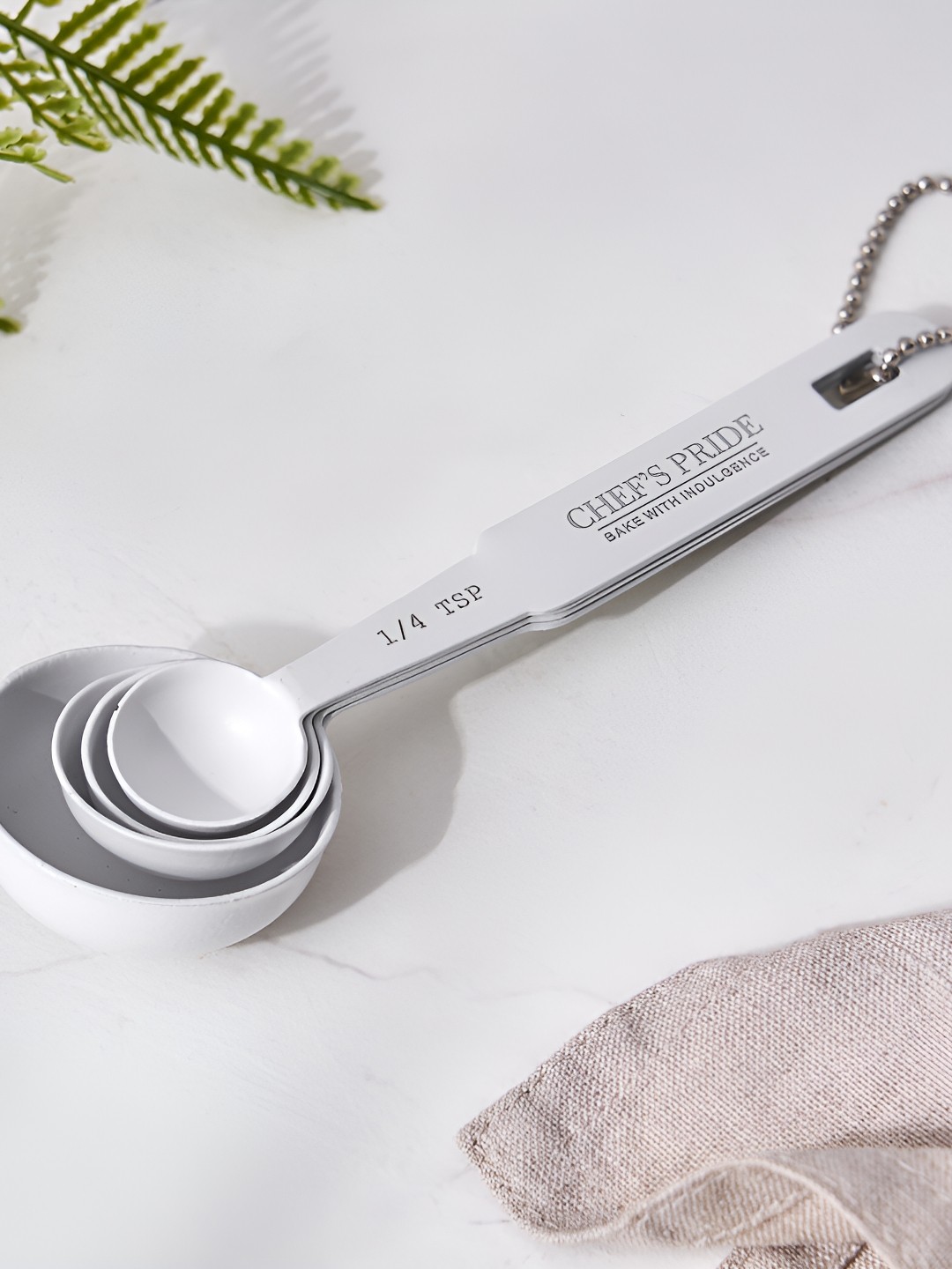 

Home Centre 4 Pcs Chef's Pride Altai Stainless Steel Measuring Spoons, White