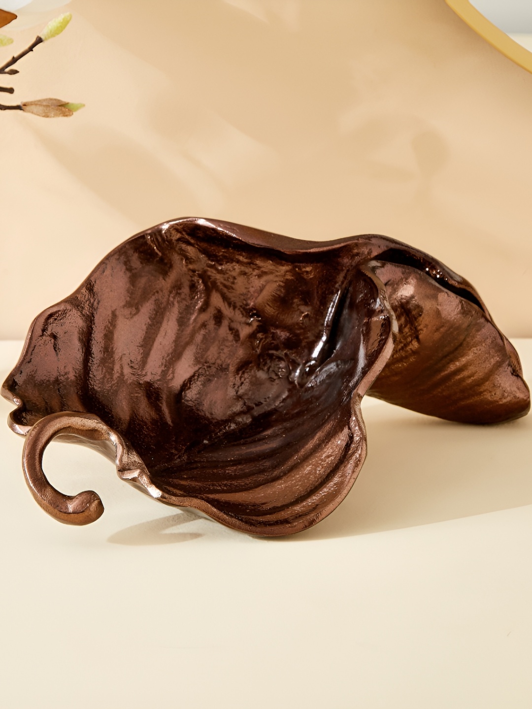 

Home Centre Copper-Toned Figurine Showpiece