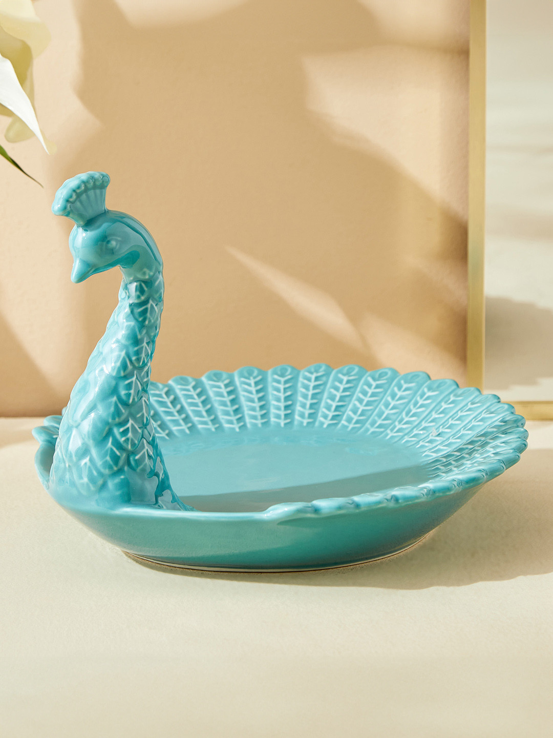 

Home Centre Teal Figurine Showpiece
