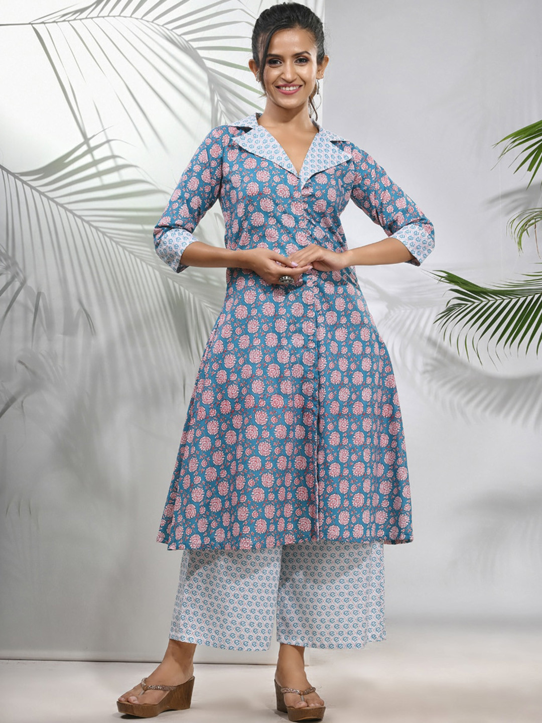 

Charukriti Floral Printed Shawl Collar Three-Quarter Sleeves Cotton Kurta with Palazzos, Blue