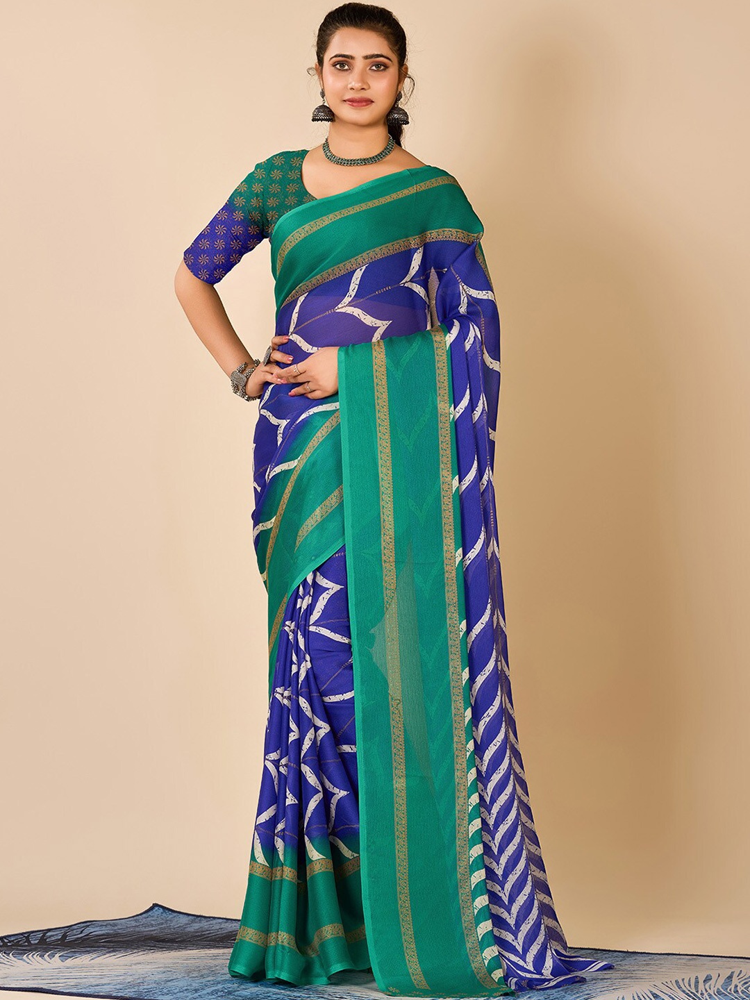 

NIRMAL CREATION Abstract Printed Saree, Blue