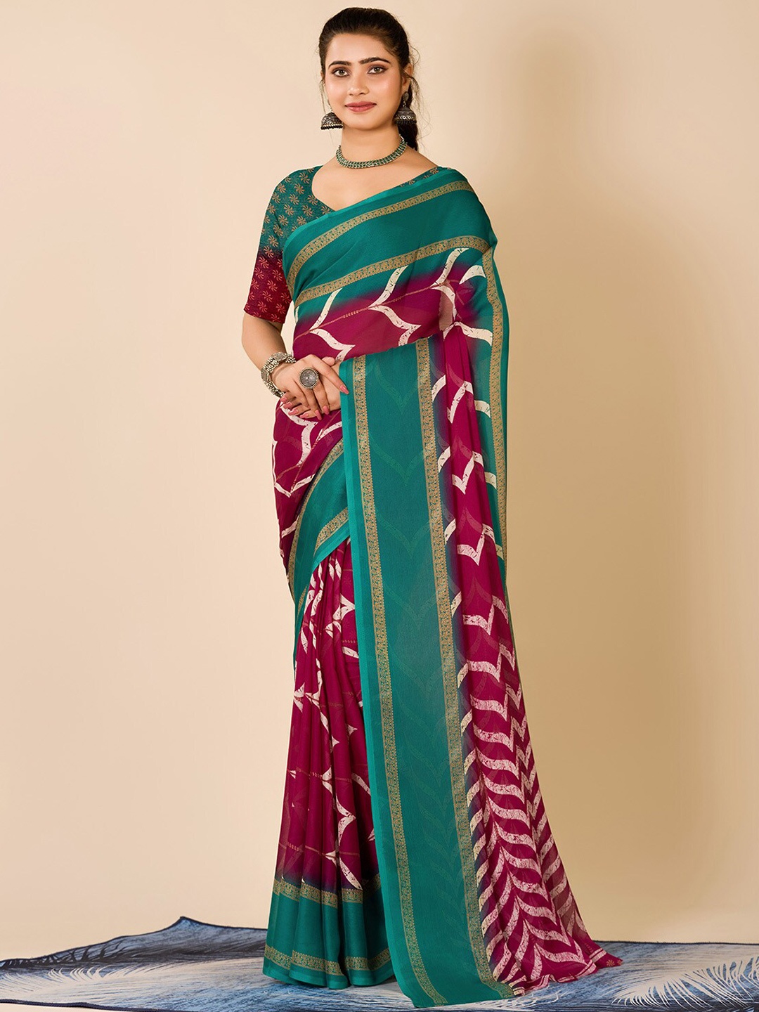 

NIRMAL CREATION Zari Abstract Printed Saree, Maroon