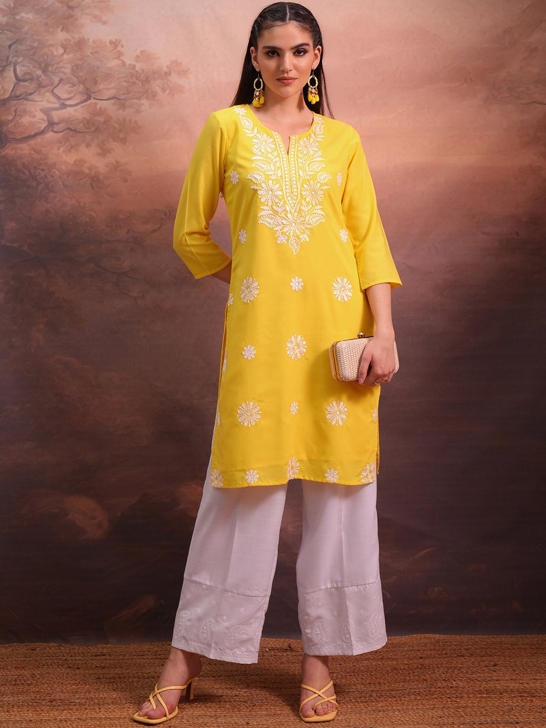 

Vishudh Yellow Floral Embroidered Straight Kurta