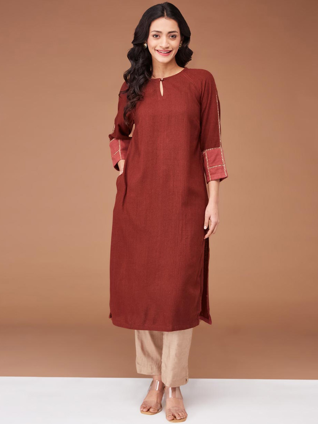 

Fabindia Key Hole Neck Three-Quarter Sleeves Extended Sleeves Straight Kurta, Maroon