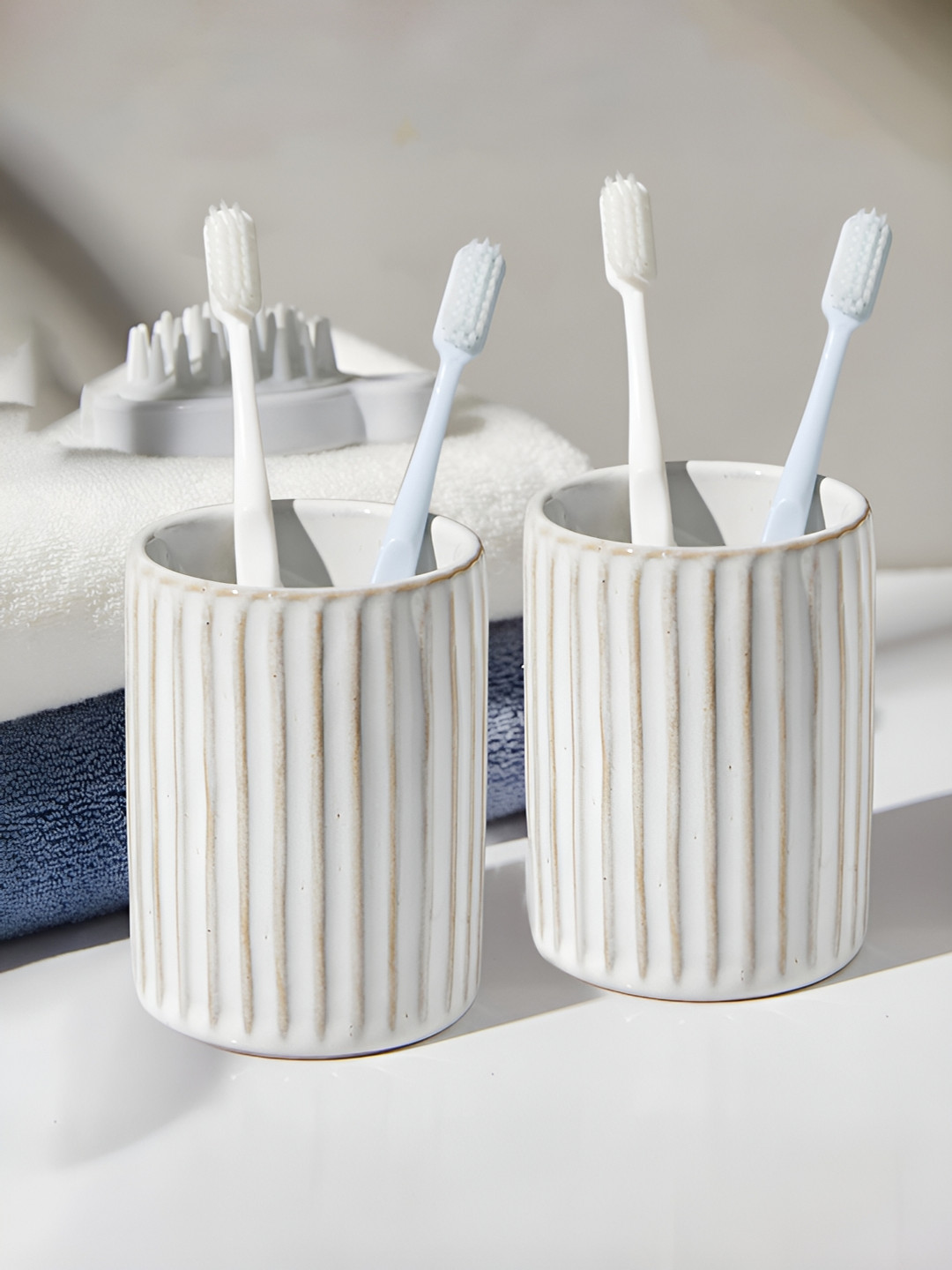 

Anko White 2 pieces Striped Ceramic Toothbrush Holders