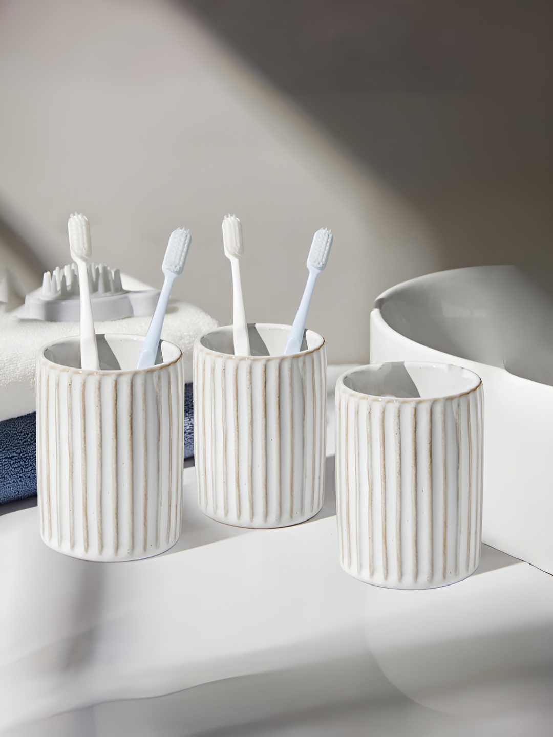 

Anko White 3 pieces Striped Ceramic Toothbrush Holders