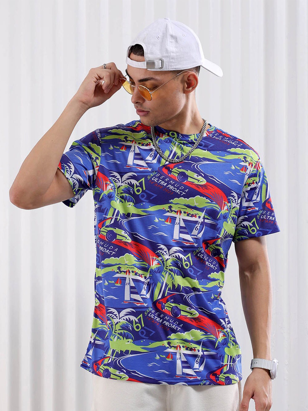 

The Indian Garage Co Blue Tropical Printed Slim Fit T-shirt