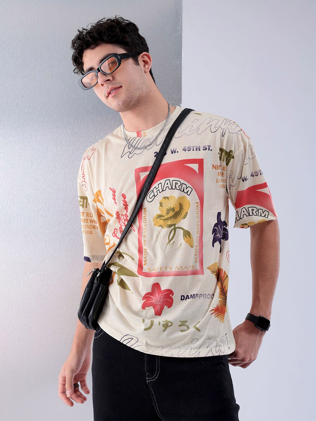 

The Indian Garage Co Beige Typography Printed Drop Shoulder Sleeves Oversized T-shirt