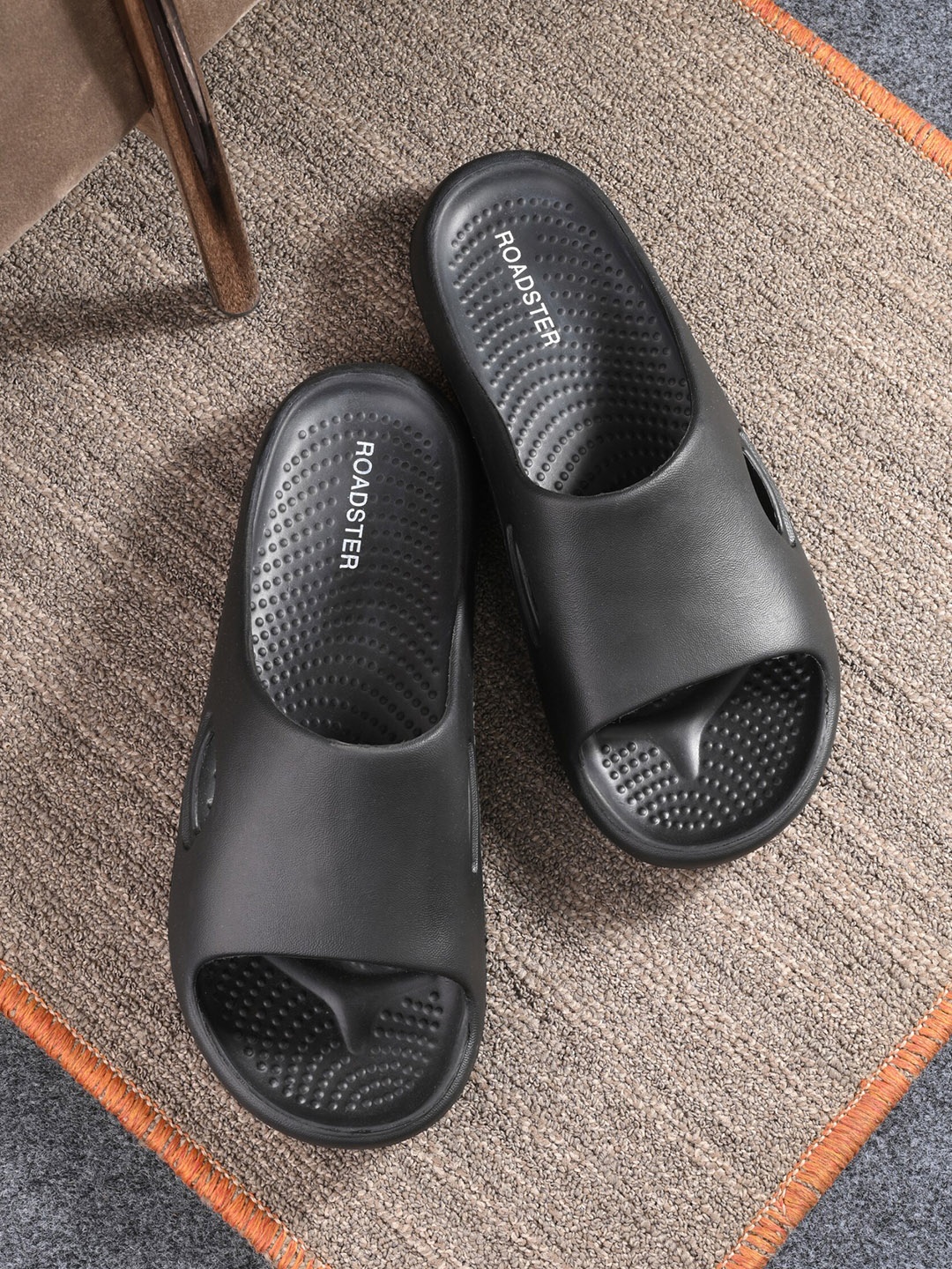 

The Roadster Lifestyle Co. Men Black Flip Flops