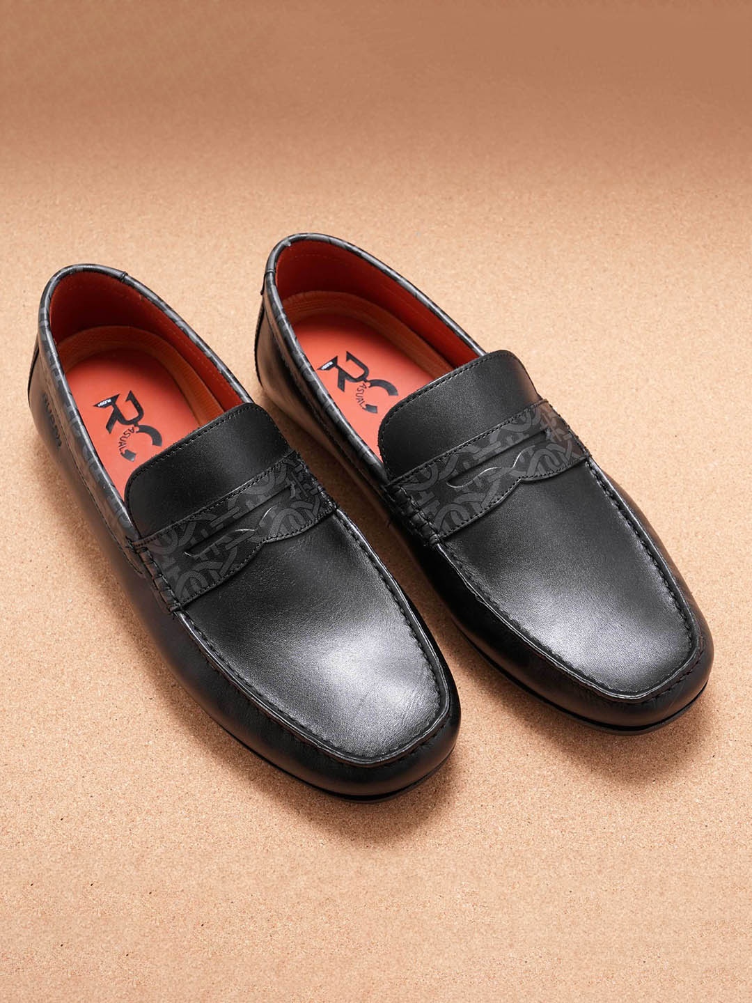 

Ruosh Men Round Toe Leather Penny Loafers, Black