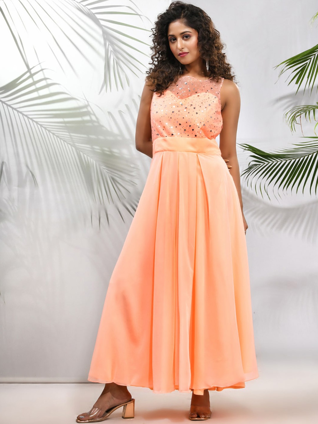 

Charukriti Embellished Sleeveless Fit & Flared Maxi Gown With Bow, Peach
