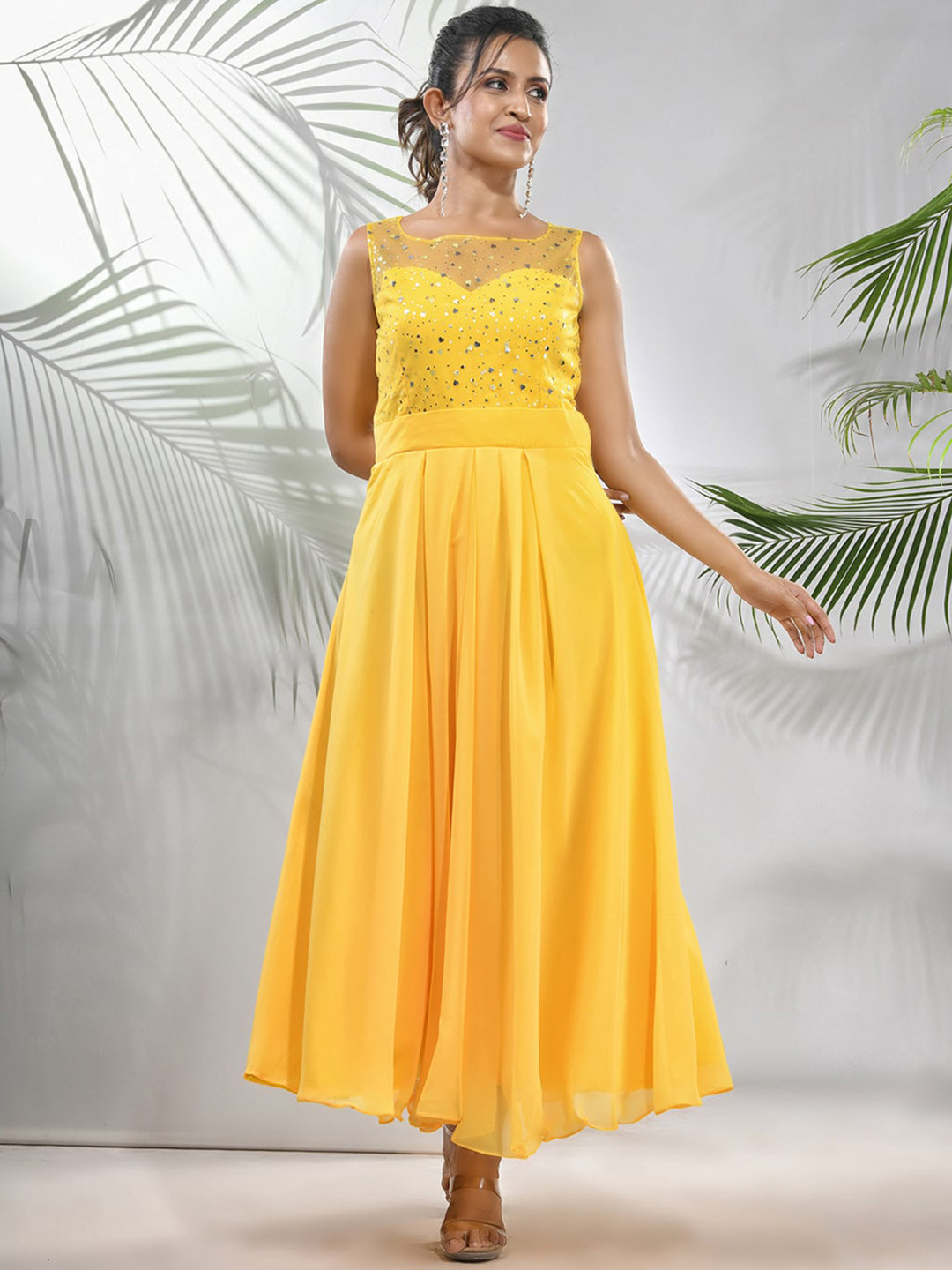 

Charukriti Embellished Sleeveless Fit & Flared Maxi Gown With Bow, Yellow