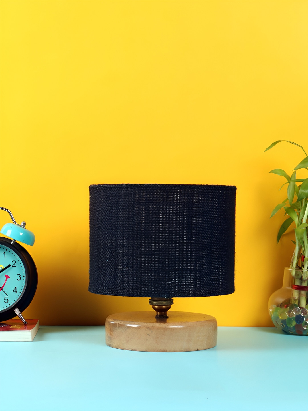 

Devansh Black Wooden Traditional Cylindrical Shaped Table Lamp