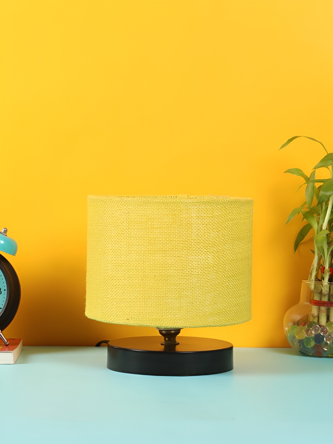 

Devansh Yellow Wooden Cylindrical Shaped Contemporary Table Lamp
