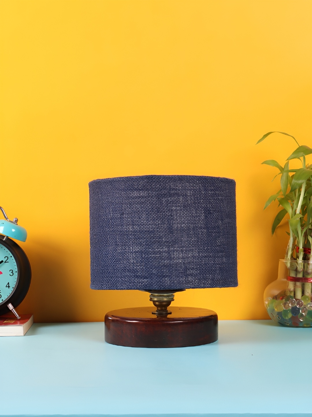 

Devansh Blue Wooden Cylindrical Shaped Table Lamp