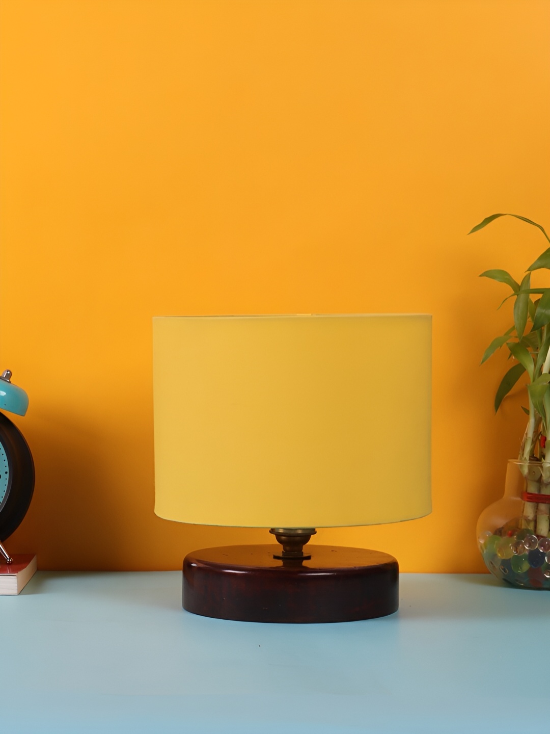 

Devansh Yellow Wooden Traditional Cylindrical Shaped Table Lamp