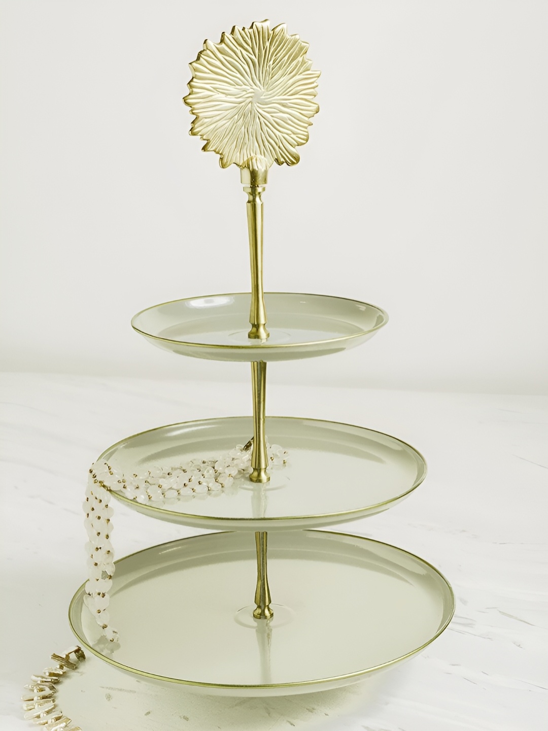 

Living With Elan Off White Stainless Steel Dhoora Three Tier Round Steel Cake Stand