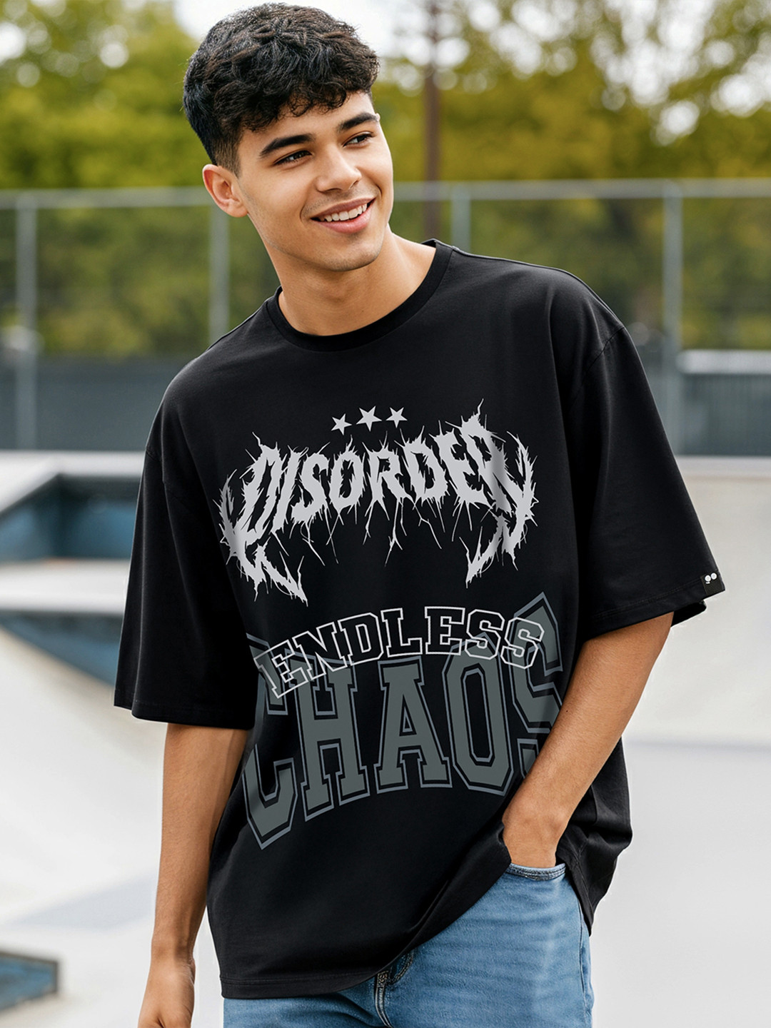 

Bewakoof Chaos Graphic Printed Oversized Cotton T-shirt, Black