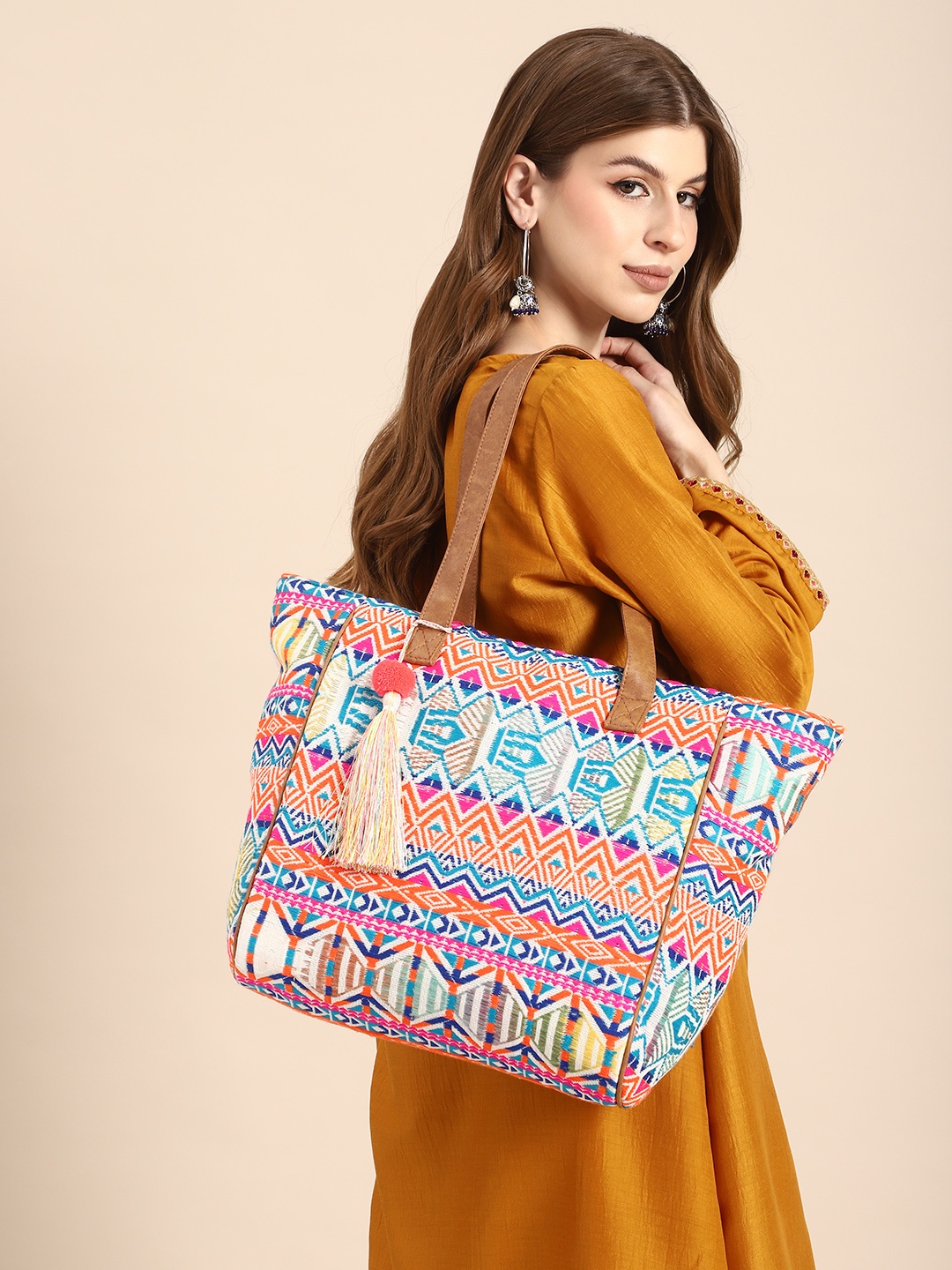 

Sangria Geometric Printed Oversized Shopper Tote Bag with Tasselled, Coral
