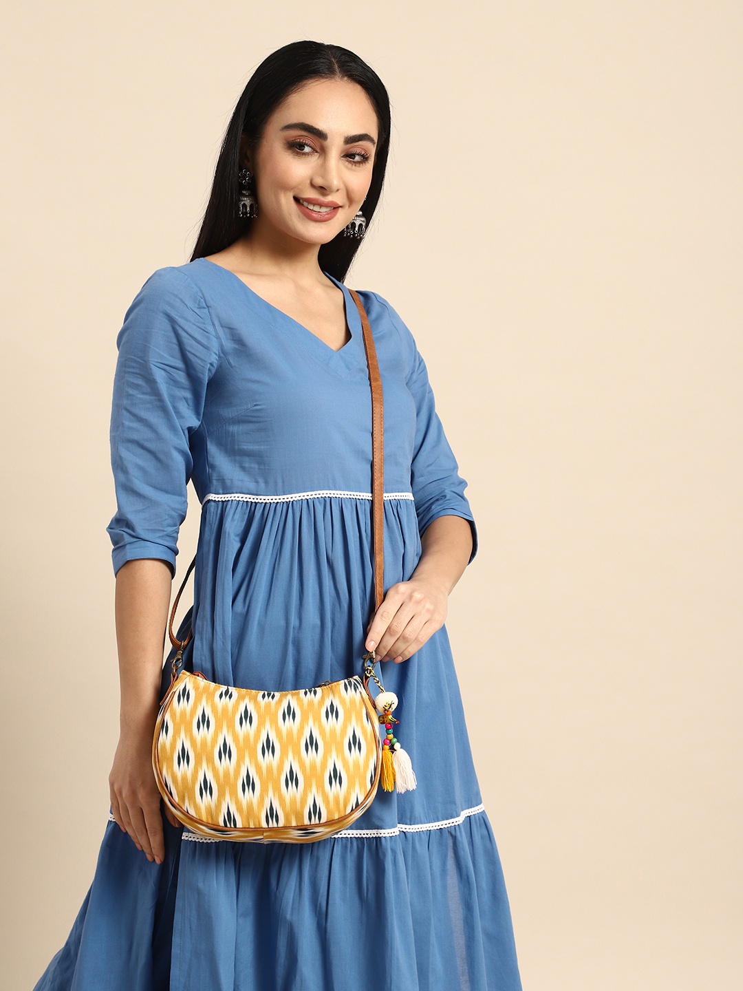 

Anouk Printed Structured Sling Bag with Tasselled Detail, Mustard