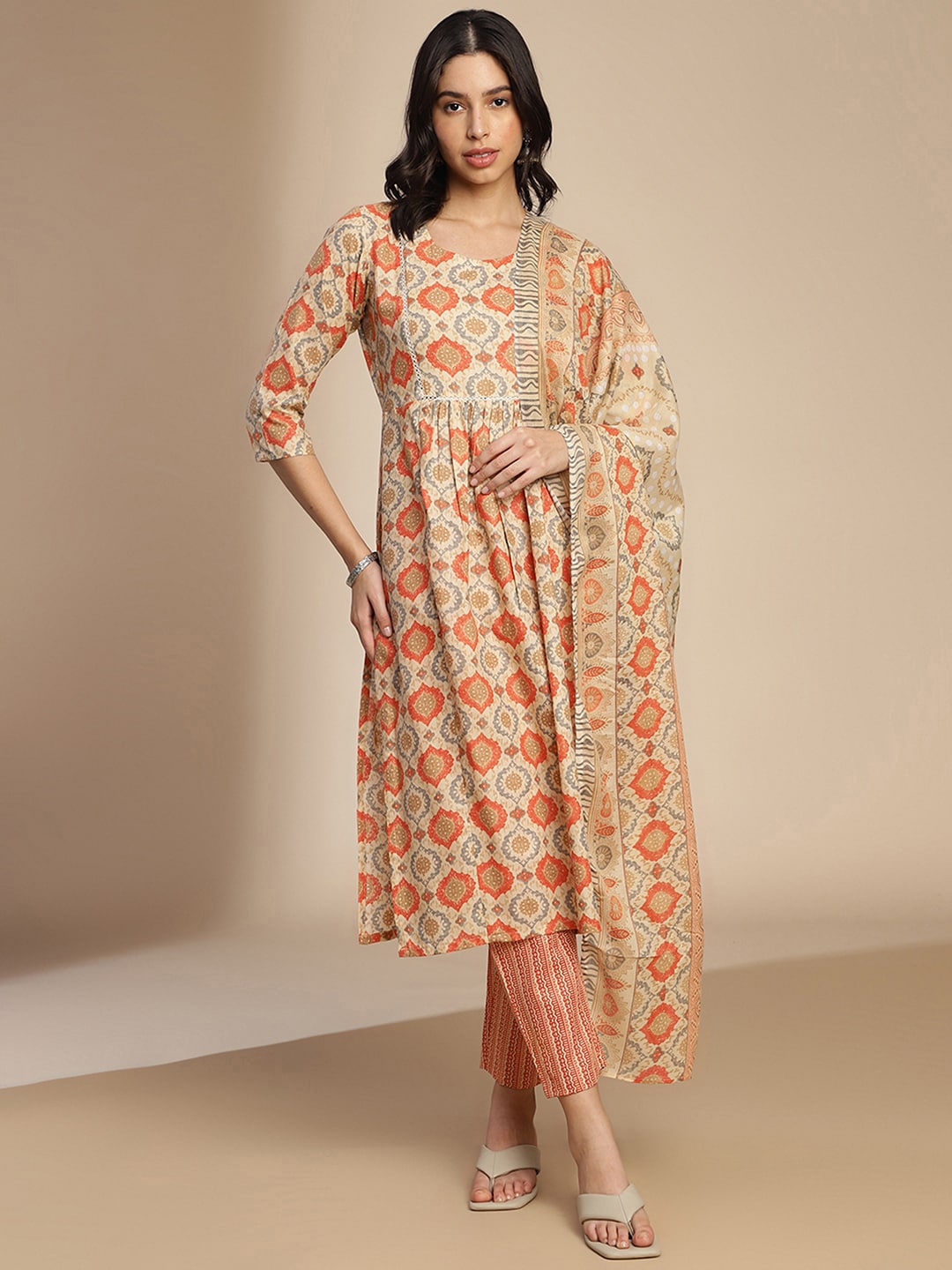 

SKYLEE Women Ethnic Motifs Printed Regular Kurta with Trousers & With Dupatta, Beige