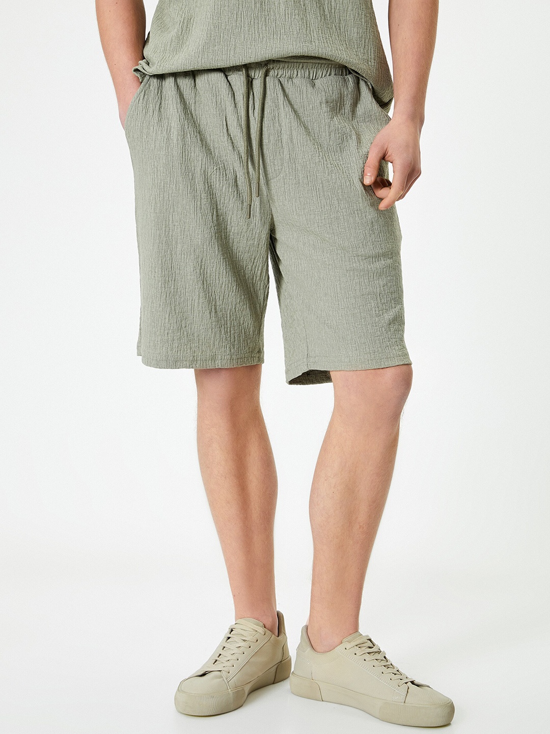 

Koton Men Self Design Mid-Rise Cotton Regular Shorts, Green