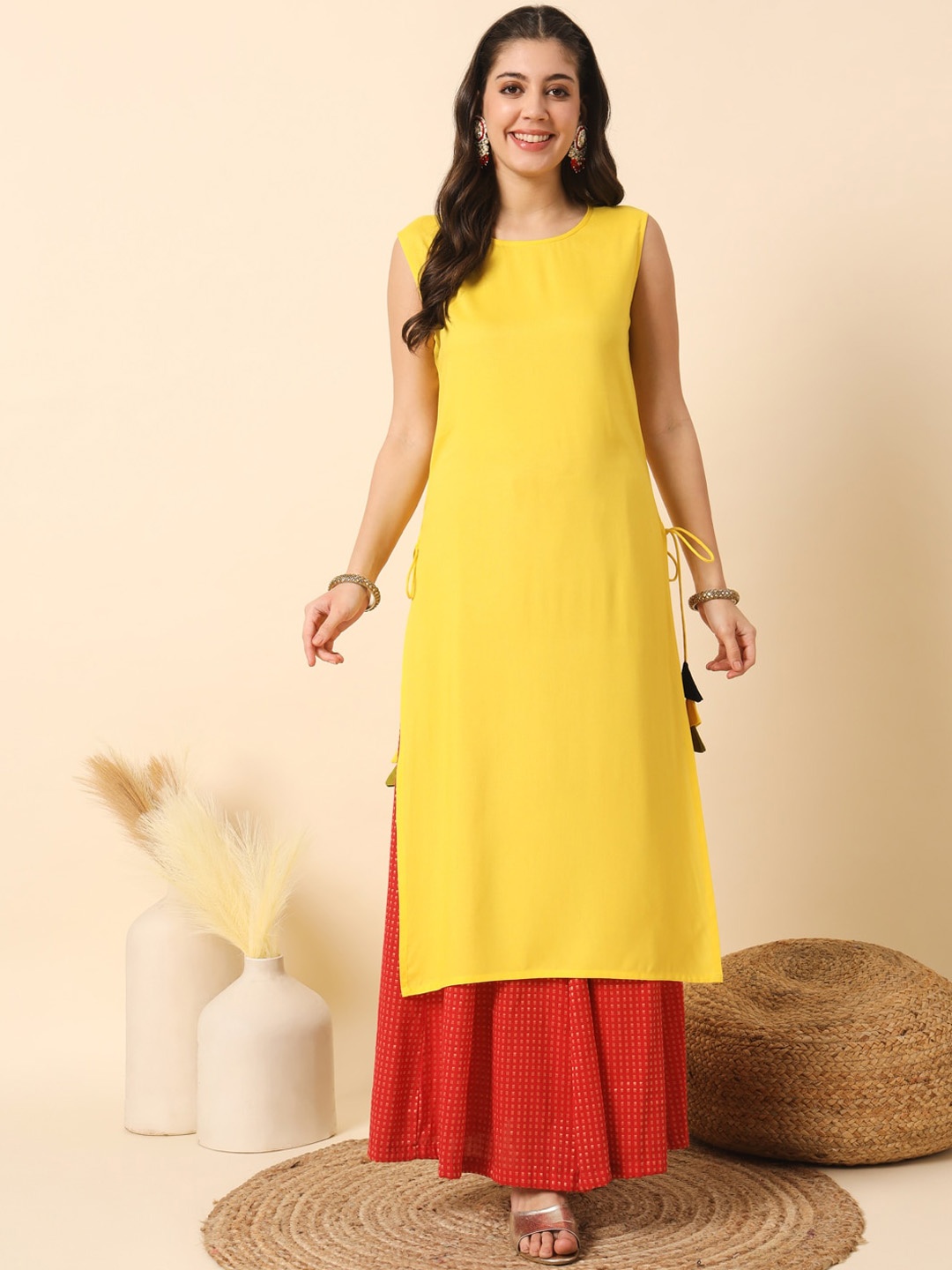 

Meeranshi Round Neck Sleeveless A-Line Kurta, Yellow