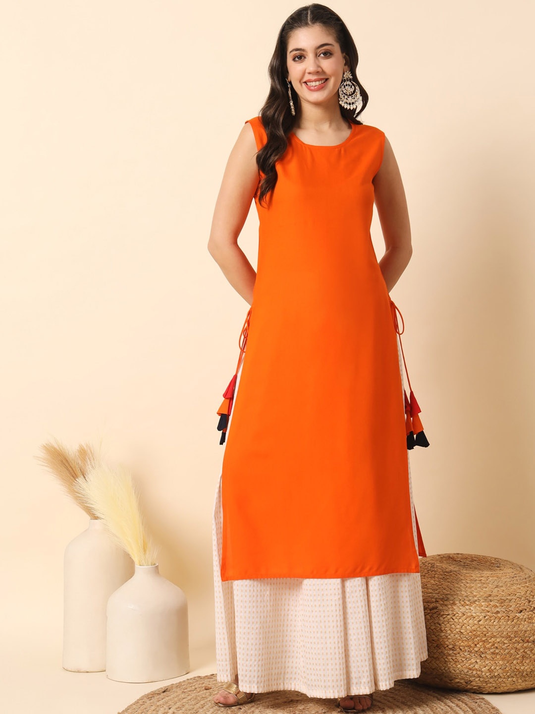 

Meeranshi Yoke Design Round Neck Sleeveless Thread Work Kurta, Orange