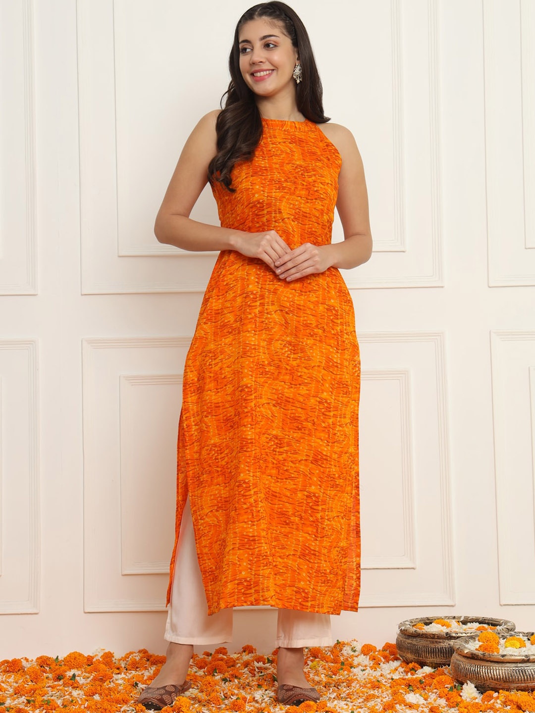 

Meeranshi Halter Neck Sleeveless Bandhani Printed Straight Pure Cotton Kurta with Trouser, Orange