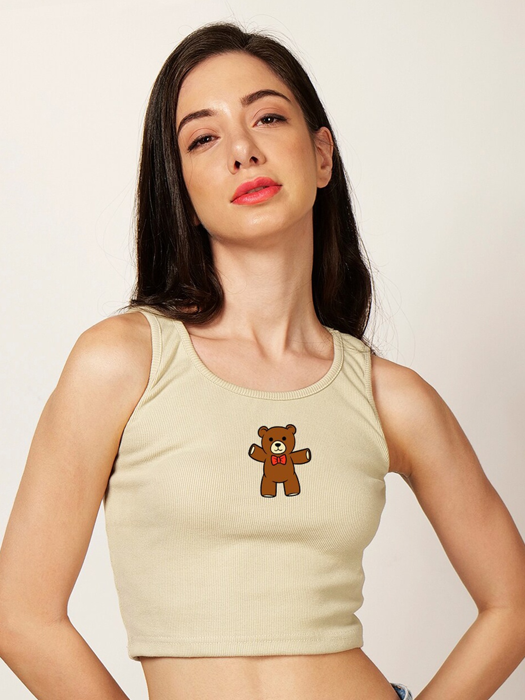 

Fashion And Youth Graphic Printed Round Neck Sleeveless Cotton Crop Top, Beige