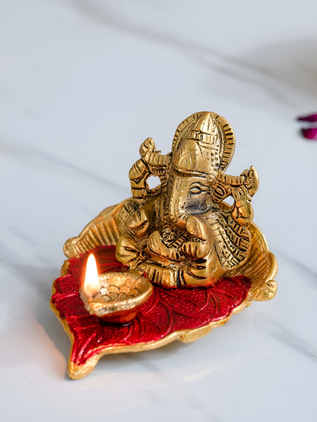 

DecorTwist Beige & Red Lord Ganesha With Diya Pooja Essentials